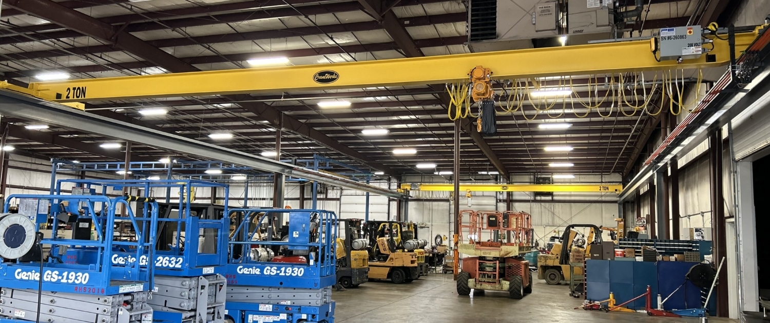 Industrial Equipment Repair Facility has Service Crane Company install multi-overhead bridge crane system